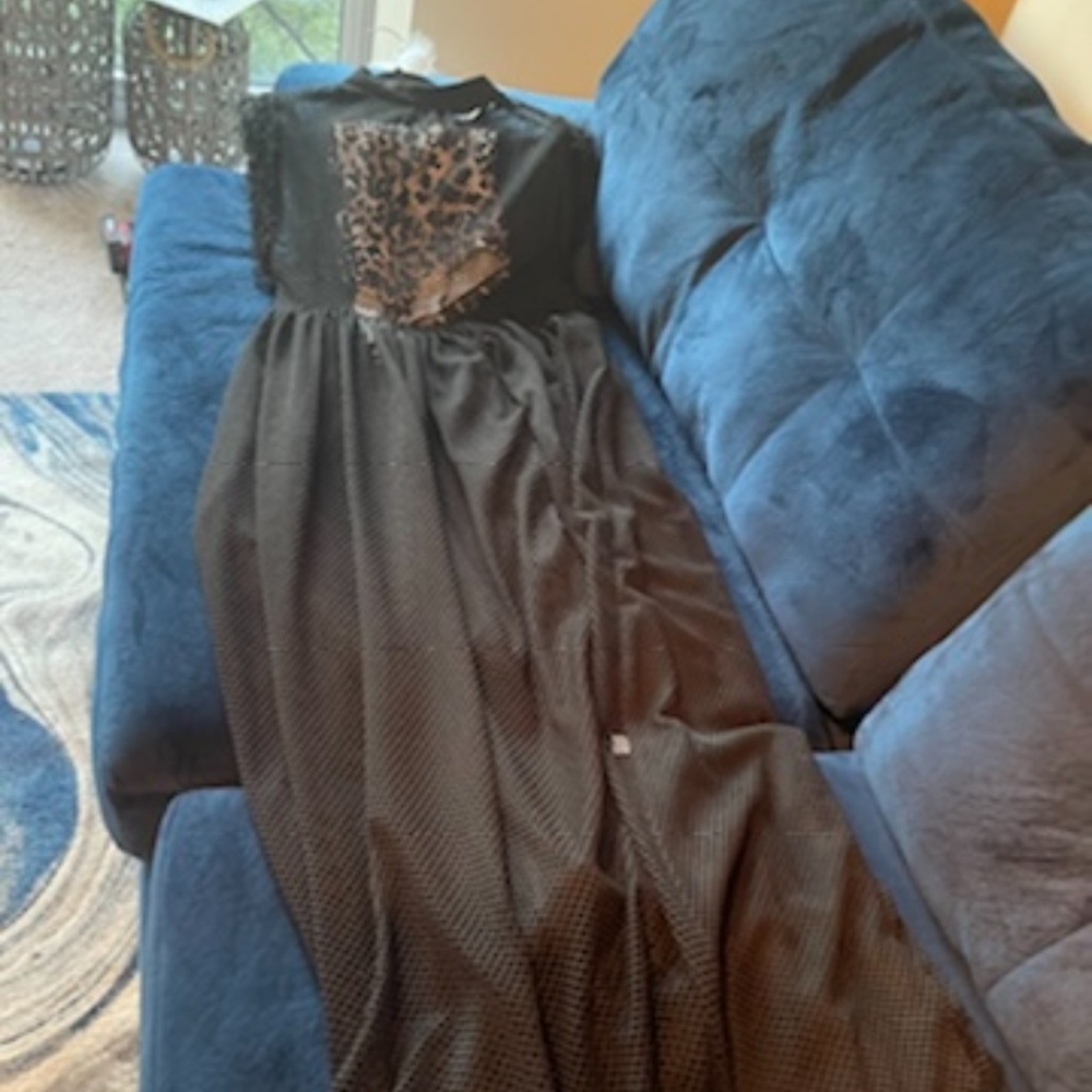 Black coverup can be worn as a dress leopard swim suit included